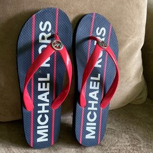 MK blue and red flip flops